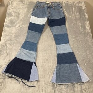 Levi's  Women's Jeans Size 25 550 Relaxed‎ Fit Patchwork Flare Distressed Hem